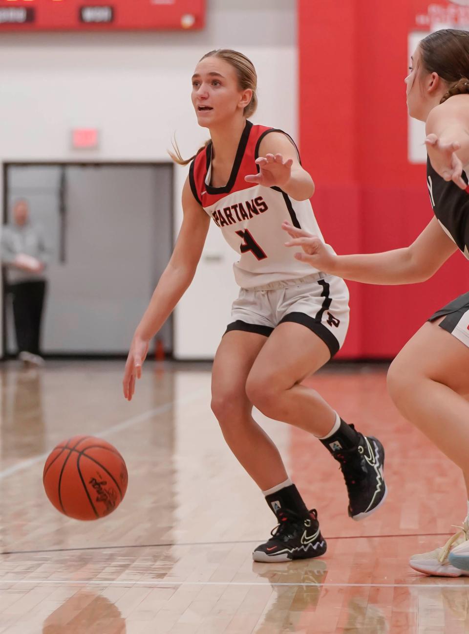 Pleasant's Emerson Williams sets up a play against Shelby in a girls basketball game last week.