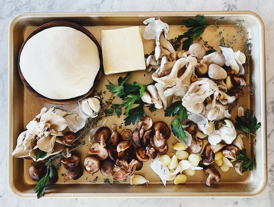 This traditional Italian pizza has fresh ingredients with earthy flavor like wild mushrooms and savory garlic. (Justin Coit / Aperol)