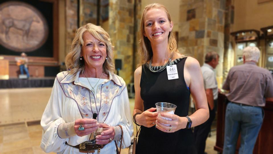 Artists Kathryn Merril, left, and Rachel Brownlee were two of the more than 60 artists who submitted work for the 15th annual AQHA Art Show Aug 12. in Amarillo.