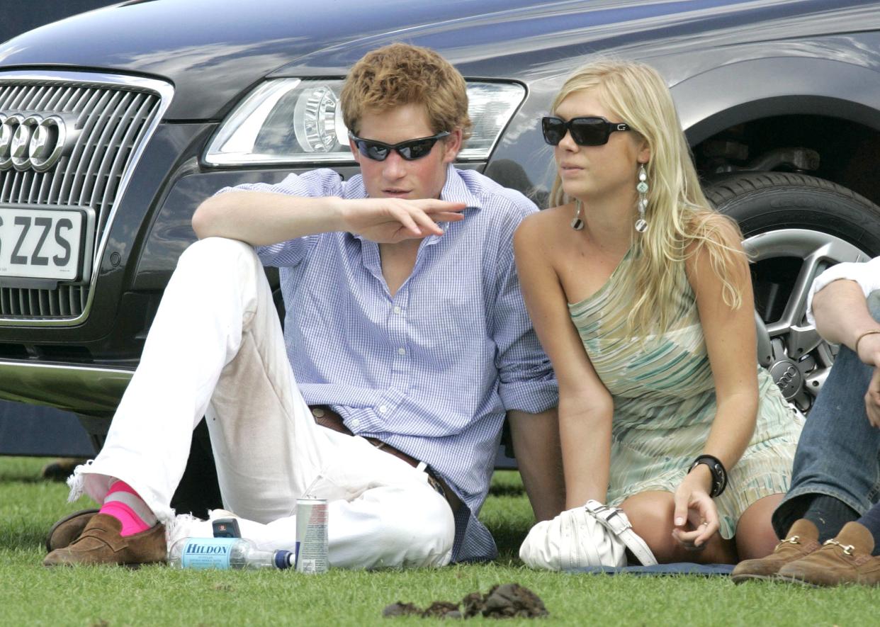 EGHAM, UNITED KINGDOM - JULY 30:  Prince Harry and his girlfriend Chelsy Davy attend the Cartier International Polo match at the  Guards Polo Club on 30 July, 2006 in Egham, England.  (Photo by MJ Kim/Getty Images)