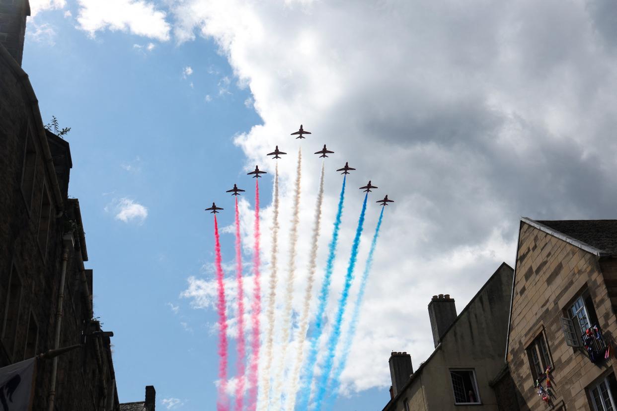 The Red Arrows fly over the Royal Mile (REUTERS)