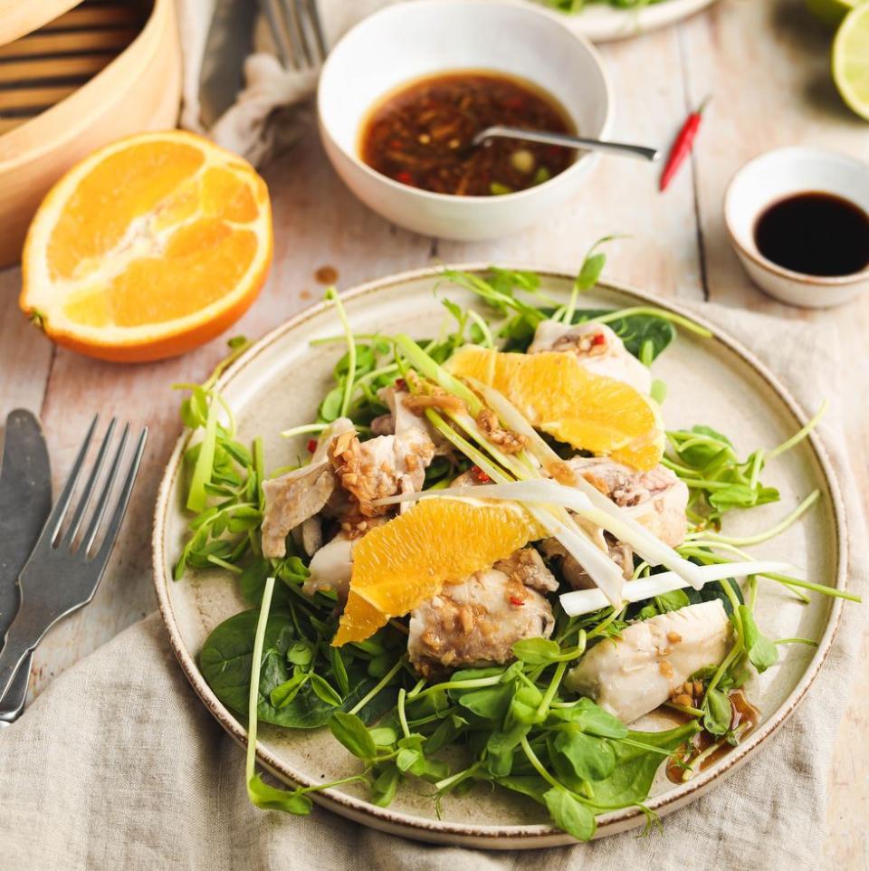 <p>Healthy and modern, Chinese food has never tasted so good! And the marinated chicken is *chef's kiss.*</p><p>Get the<a href="https://www.delish.com/uk/cooking/recipes/a38565764/steamed-chicken/" rel="nofollow noopener" target="_blank" data-ylk="slk:Steamed Chicken with Ginger Orange Dressing" class="link "> Steamed Chicken with Ginger Orange Dressing</a> recipe.<br></p>