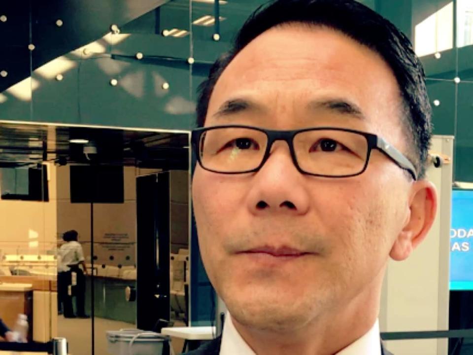 Sean Chu, who narrowly won re-election Monday in Ward 4 by 52 votes, was involved in a 2008 fight with his wife that ended with police responding and seizing a firearm, CBC News has confirmed through court records.  (Bryan Labby/CBC - image credit)
