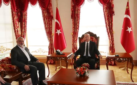 Turkish president Recep Tayyip Erdogan (R) met with Ismail Haniyeh, the leader of Hamas (L) - Credit: TURKISH PRESIDENCY PRESS OFFICE / AFP