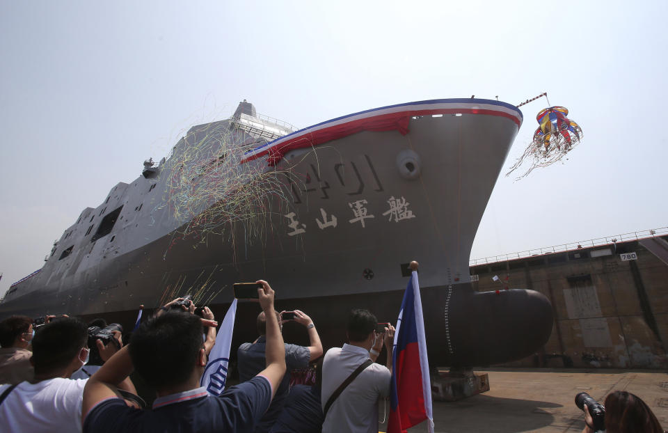 This photo shows the Yushan transport ship during a launch ceremony for its first indigenous amphibious transport dock in Kaohsiung, southern Taiwan, Tuesday, April 13, 2021. (AP Photo/Chiang Ying-ying)