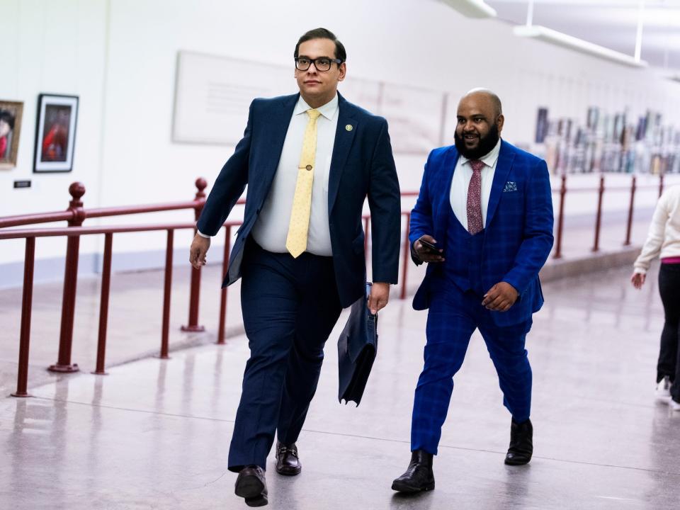 Santos walking with operations manager Vish Burra in the Cannon Tunnel at the Capitol on Thursday, January 12.