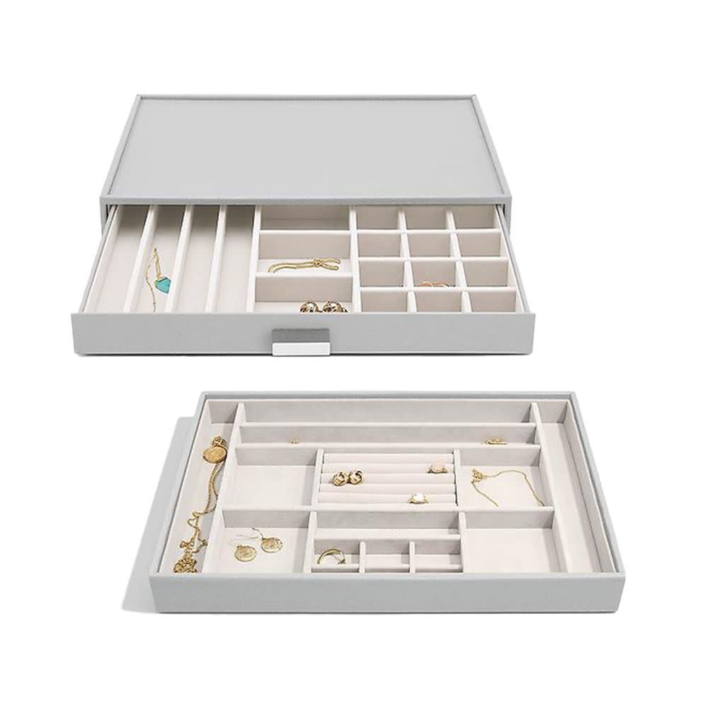 <p><a href="https://go.redirectingat.com?id=74968X1596630&url=https%3A%2F%2Fwww.containerstore.com%2Fs%2Fclearance%2Fstackers-pebble-grey-supersize-jewelry-box-collection%2F1d%3FproductId%3D11015270&sref=https%3A%2F%2Fwww.elle.com%2Ffashion%2Fshopping%2Fg42514359%2Fbest-jewelry-organizers%2F" rel="nofollow noopener" target="_blank" data-ylk="slk:Shop Now;elm:context_link;itc:0;sec:content-canvas" class="link rapid-noclick-resp">Shop Now</a></p><p>Supersize Jewelry Box Collection</p><p>$22.79</p><p>containerstore.com</p><span class="copyright">Courtesy</span>