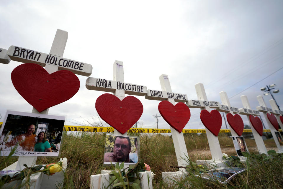 <p>A line of crosses in remembrance of the eight members of the Holcombe family killed in the shooting at the First Baptist Church of Sutherland Springs, Texas, Nov. 9, 2017. (Photo: Rick Wilking/Reuters) </p>