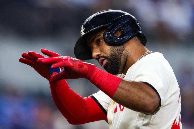 Texas Rangers' Ezequiel Duran looks up after hitting a single