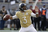 NFC quarterback Russell Wilson, of the Seattle Seahawks, (3) looks to pass, during the first half of the NFL Pro Bowl football game against the AFC, Sunday, Jan. 26, 2020, in Orlando, Fla. (AP Photo/Chris O'Meara)