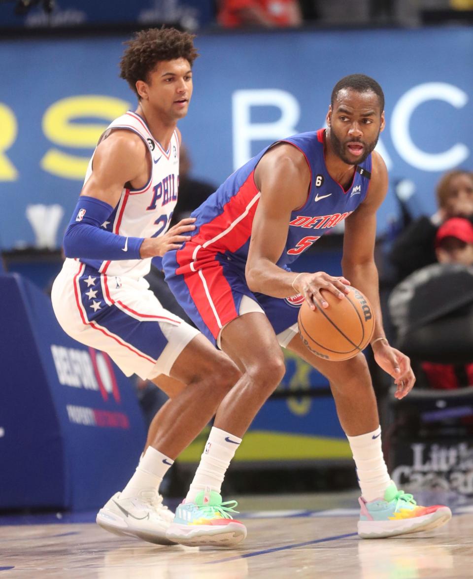 Pistons guard Alec Burks (right) drives against 76ers guard Matisse Thybulle during the fourth quarter Jan. 8, 2023 in Detroit.