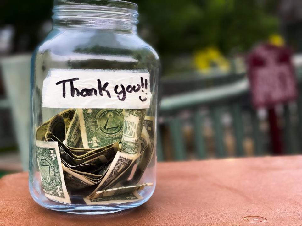 tip jar with the words ‘thank you’ on it