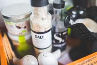 <p>Overdoing it on the salt, can cause you to retain water which could lead to bloating, says Dr Glenville. [Photo: Kaboom Pics // Karolina via Pexels] </p>