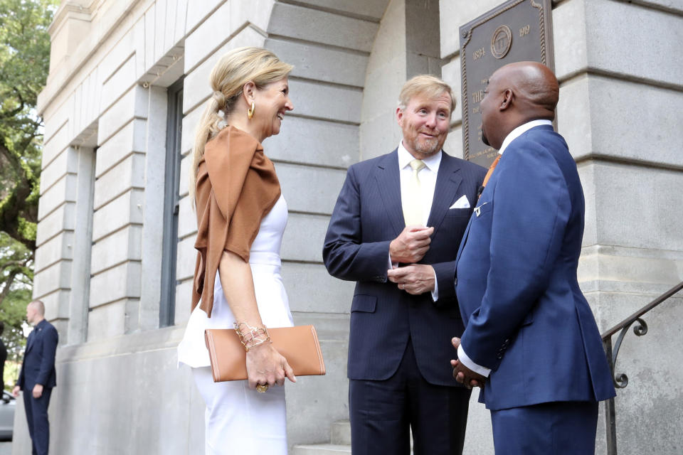 King Willem-Alexander and Queen Maxima, of the Netherlands, talk with Savannah Mayor Van Johnson, Tuesday, June 11, 2024, outside of City Hall in Savannah, Ga. The Dutch royals spent the second day of their U.S. tour Tuesday visiting Savannah, Georgia's oldest city that is both a historic gem and a growing powerhouse in global trade. (Richard Burkhart/Savannah Morning News via AP, Pool)