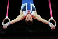 Sam Oldham of Great Britain performs on the rings during the London 2012 Olympic Games Artistic Gymnastics competition, London, Britain, 28 July 2012. EPA/Rolf Vennenbernd