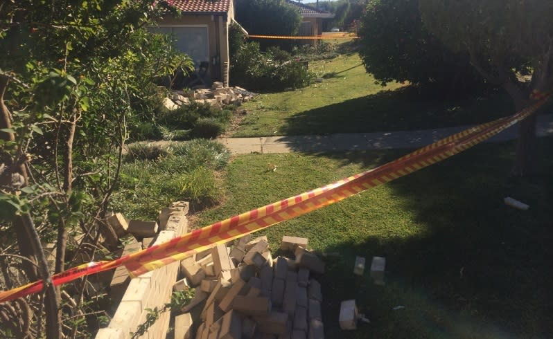 The car crashed through an asbestos fence and two brick walls. Picture: Liam Croy/The West Australian