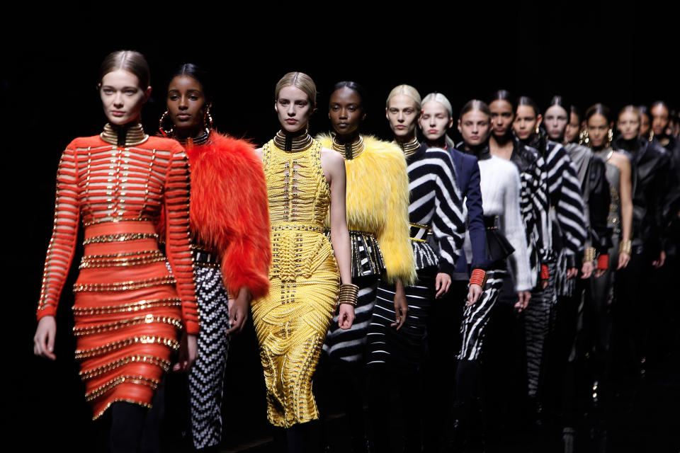 Models wear creations for Balmain's ready-to-wear fall/winter 2014-2015 fashion collection, presented in Paris, Thursday, Feb.27, 2014. (AP Photo/Thibault Camus)