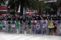 Abortion rights campaigners clash with police in Mexico City