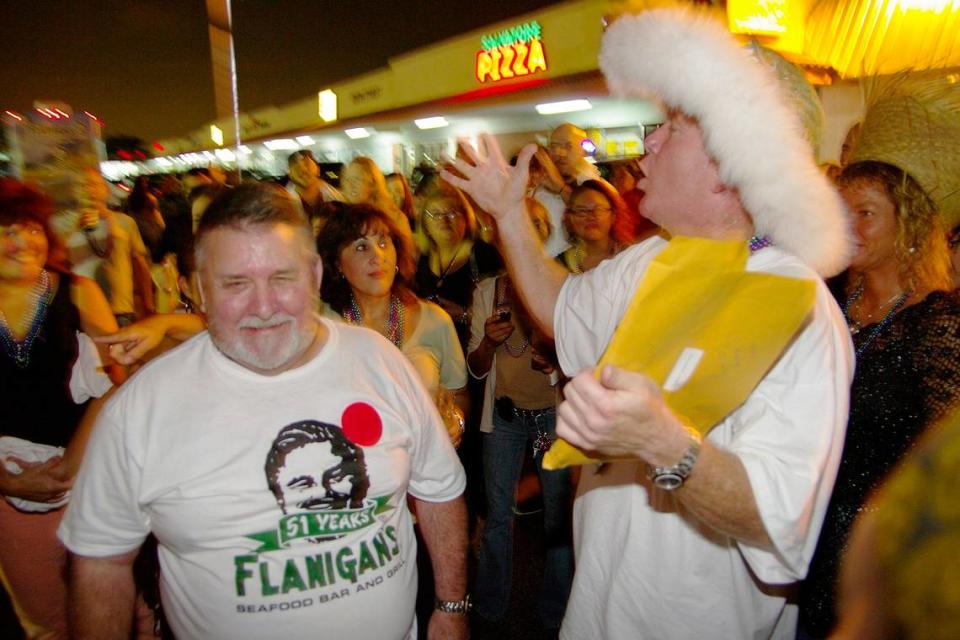 In 2010, President and CEO James G. Flanigan II announces the winner of a Joe “Big Daddy” Flanigan lookalike contest. Nelson Izquerdo, 63, of Hialeah, earned top honors.