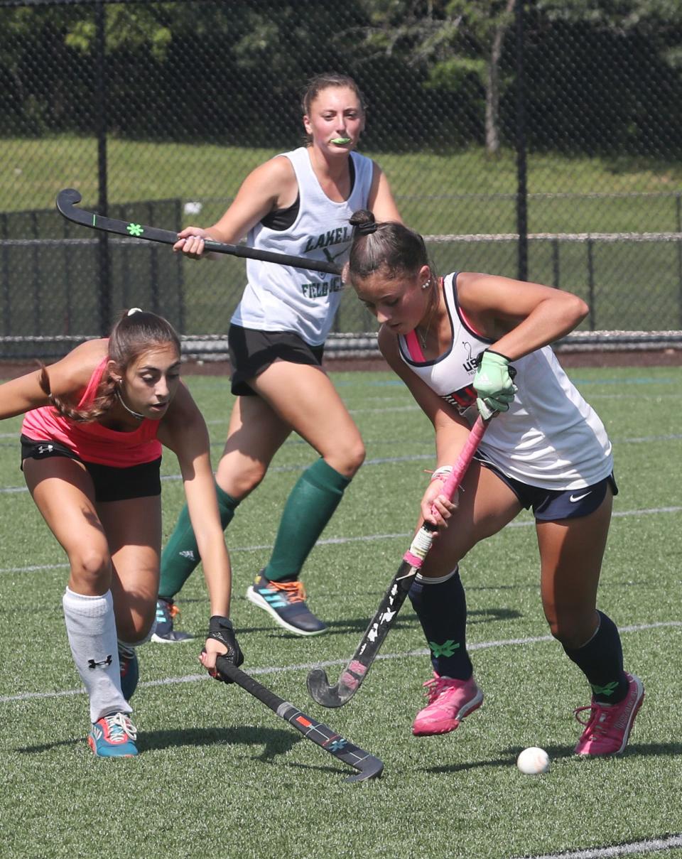 Lakeland field hockey players Emily Yazzetti, Emma Numme and Gabby Santini practice at Lakeland High School in Shrub Oak  Aug. 22, 2023. 