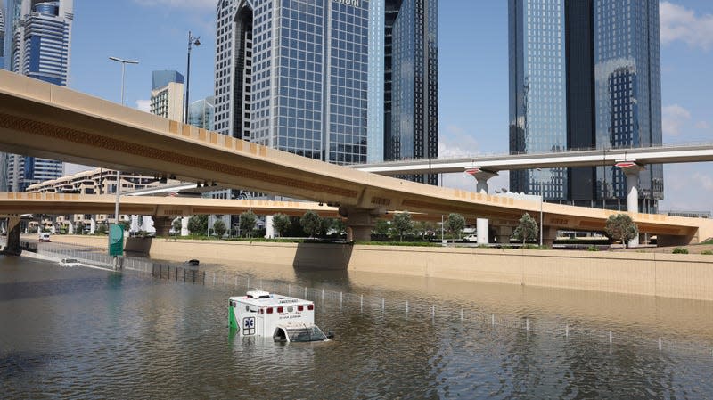 An abandoned ambulance submerged in flood water on a highway after a rainstorm in Dubai, United Arab Emirates, on Wednesday, April 17, 2024. - Photo: Christopher Pike/Bloomberg (Getty Images)