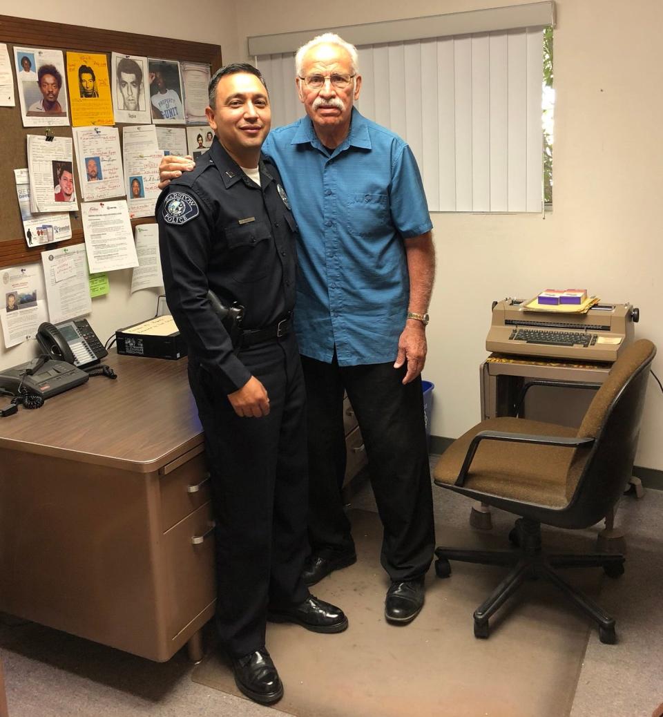 Retired Barstow Police Sergeant Andrew Espinoza, left, with retired Detective Leo Griego, who recently died after a nearly 50-year career with the police department.