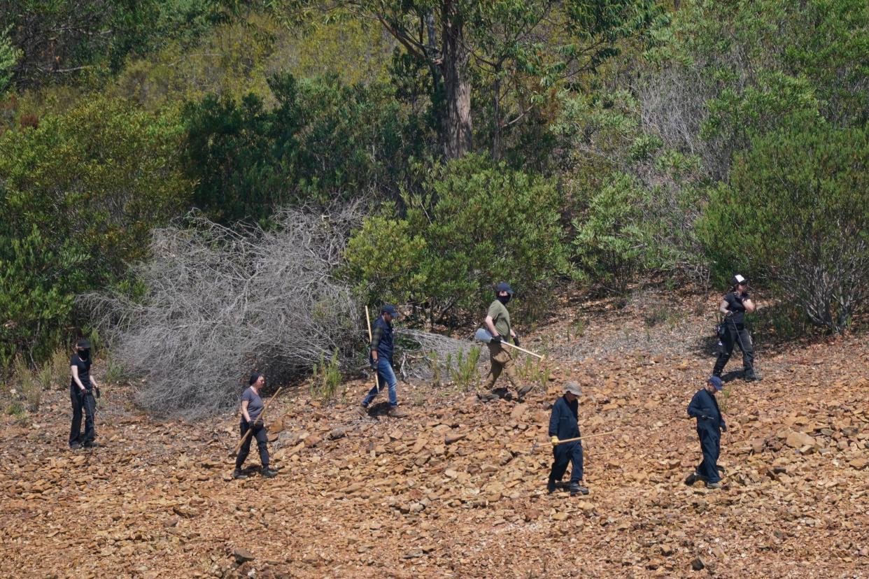 Personnel at Barragem do Arade reservoir, in the Algave, Portugal, as searches continue as part of the investigation into the disappearance of Madeleine McCann (PA Wire)
