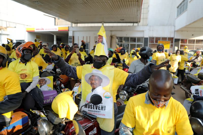 Supporters of Uganda's President Yoweri Museveni celebrate the announcement of him winning the presidential elections, in Kampala