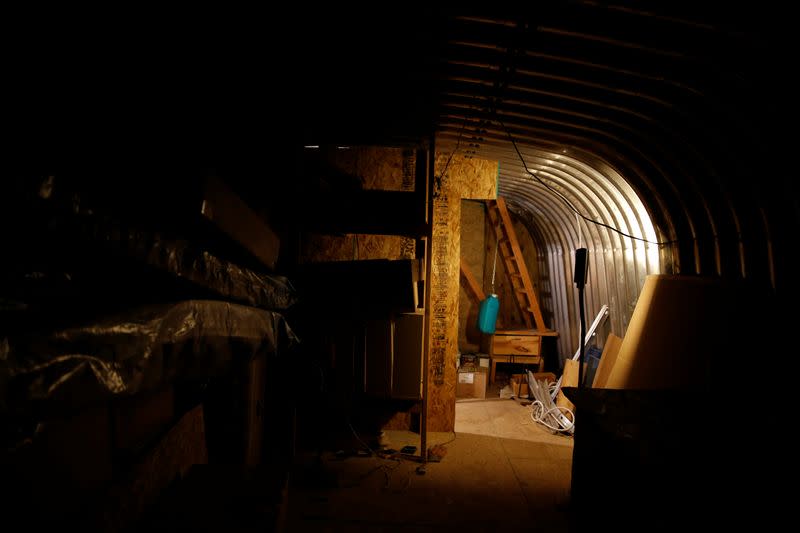 The interior of an underground shelter at a survival camp