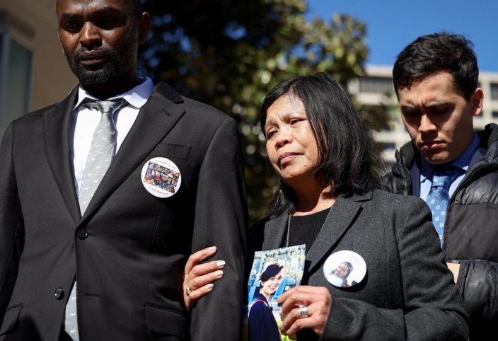 Clariss Moore, right, holds Paul Njoroge’s arm following an arraignment involving Boeing on Thursday, January 26, 2023, at the federal courthouse in Fort Worth. They both lost family members in the Ethiopian Airlines Flight 302 plane crash in 2019. Numerous family members attended an arraignment challenging the plea agreement Boeing made with the Justice Department that granted the company immunity from criminal prosecution.