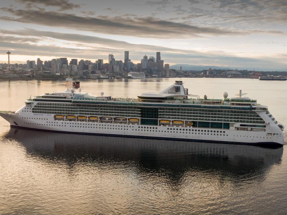 the Serenade of the Seas in the water with the Seattle skyline in the back