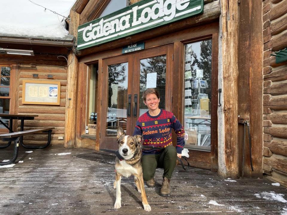 Rio the Galena Lodge “loaner dog” poses on the deck outside the lodge with his owner, Chelan Oldemeyer, on Friday, Jan. 26, 2024. Chelan and her husband, Kyle, run the county-owned lodge as concessionaires. Nicole Blanchard/nblanchard@idahostatesman.com