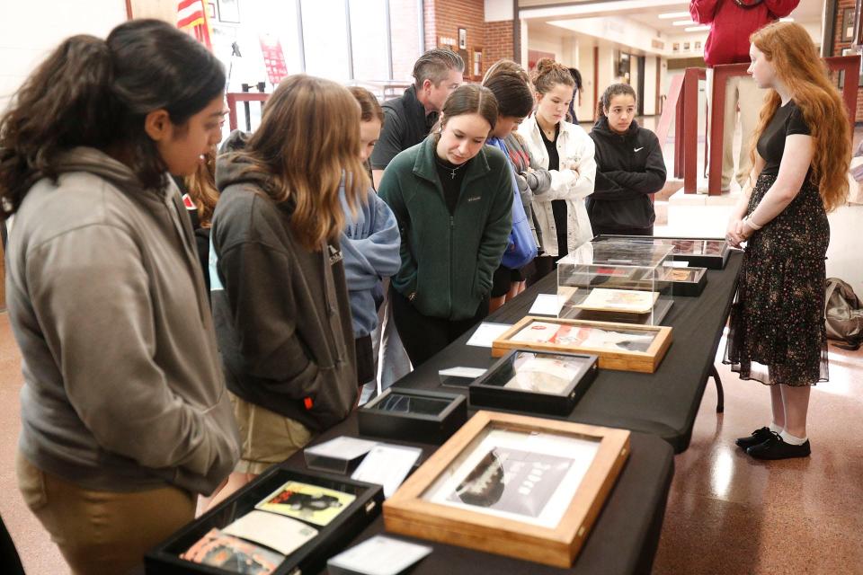 Islands High Students look at relics from WWII during the Hate Ends Now Cattle Car program on Thursday January 5, 2023 at Benedictine Military School.