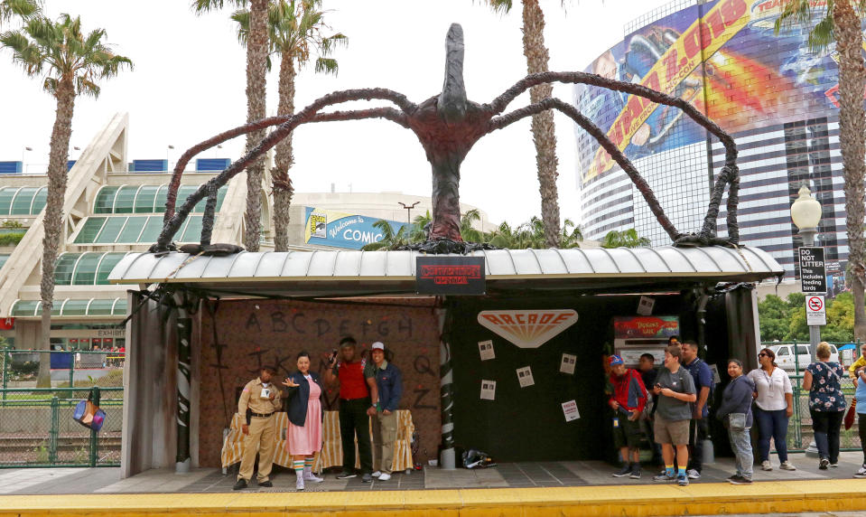 <p>Cosplayers dressed as Eleven, Chief Hopper, Dustin, and Lucas from <em>Stranger Things</em> at Comic-Con International on July 20 in San Diego. (Photo: Angela Kim/Yahoo Entertainment) </p>