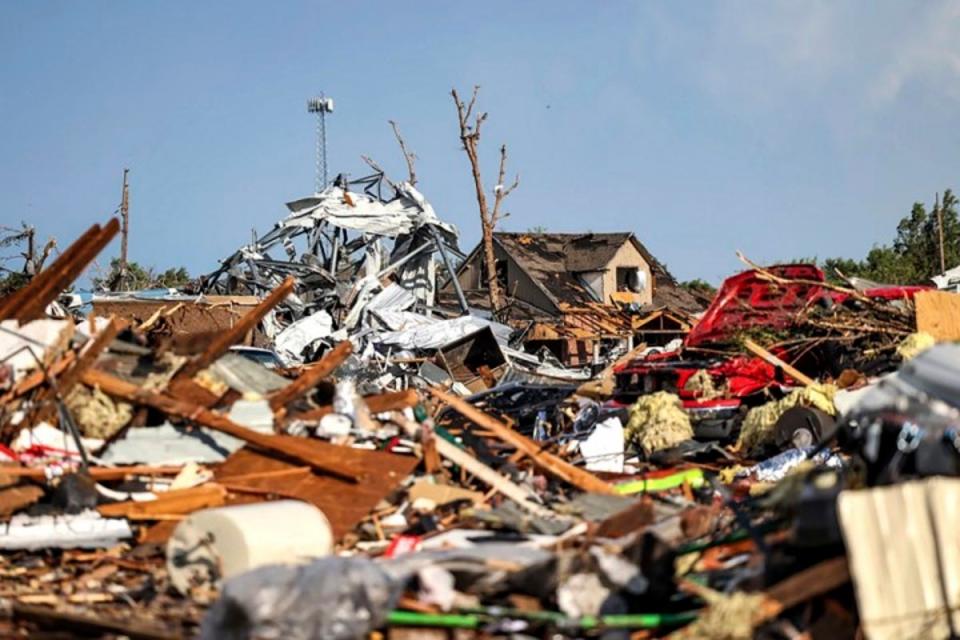 Debris covers a residential area in Perryton, Texas (AP)