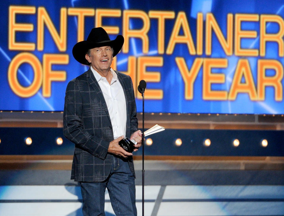 George Strait accepts the award for entertainer of the year at the 49th annual Academy of Country Music Awards at the MGM Grand Garden Arena on Sunday, April 6, 2014, in Las Vegas. (Photo by Chris Pizzello/Invision/AP)