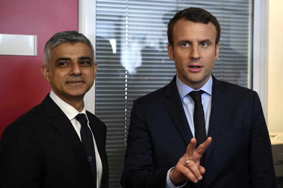 French presidential candidate Emmanuel Macron, right, meets the mayor of London Sadiq Khan Wednesday, March 29, 2017 at his campaign headquarters in Paris. (Eric Feferberg, pool via AP)