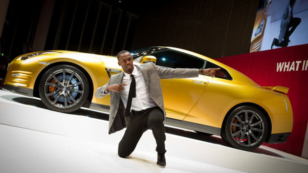 Photos: Usain Bolt gets a golden GT-R, and a title