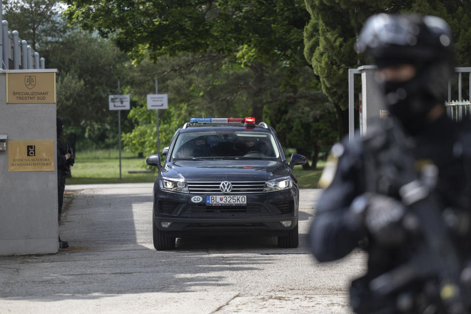 A car supposedly carrying the suspect, in shooting of Slovakia's Prime Minister Robert Fico, leaves the court in Pezinok, Saturday, May 18, 2024. Officials in Slovakia say Prime Minister Robert Fico has undergone another operation two days after his assassination attempt and remains in serious condition. (AP Photo/Tomas Benedikovic)