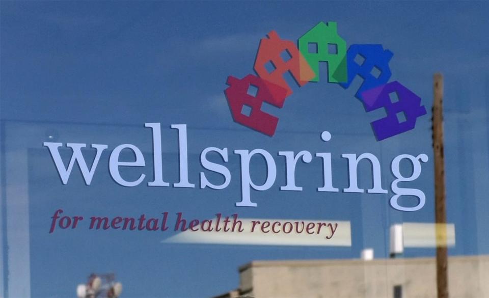 Signage at Wellspring, an agency focused on helping people with mental illness.