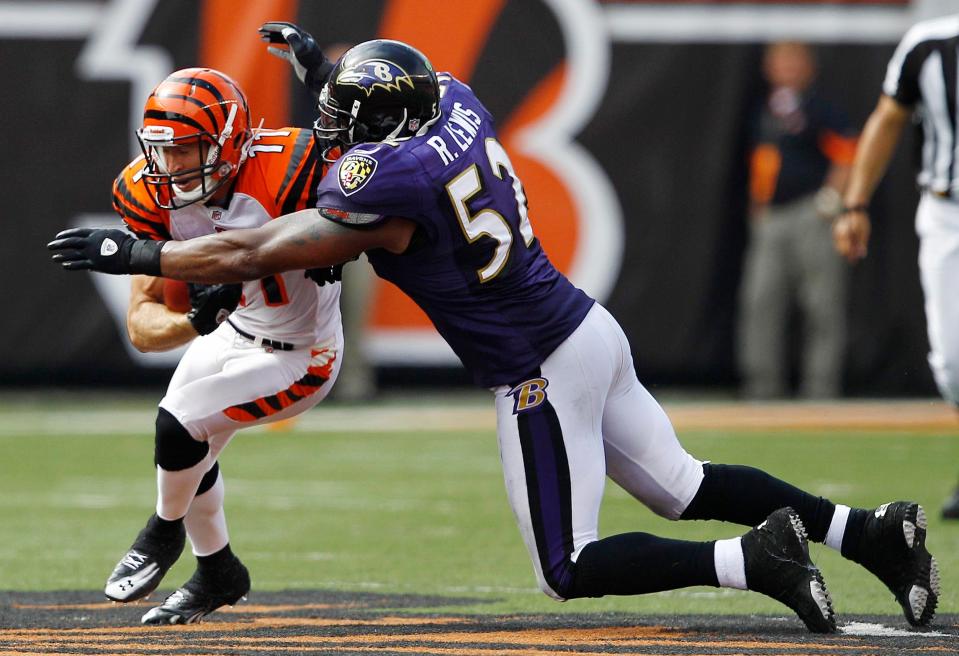 Sept 19, 2010; Cincinnati, OH, USA; Baltimore Ravens linebacker Ray Lewis (52) brings down the Cincinnati Bengals wide receiver Jordan Shipley (11) at Paul Brown Stadium. The Bengals defeated the Ravens 15-10. Mandatory Credit: Frank Victores-USA TODAY Sports