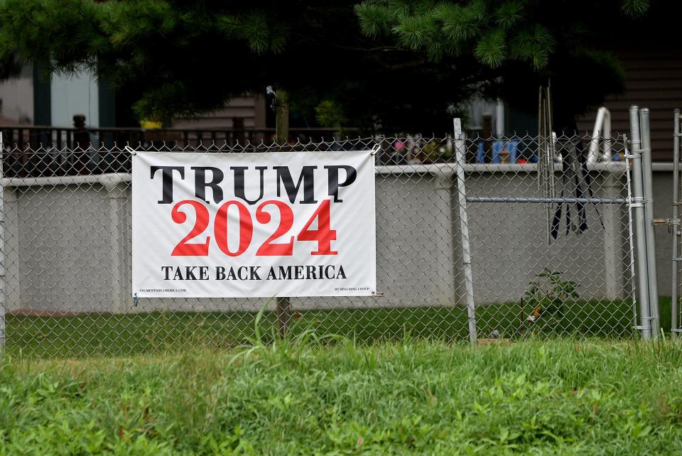 A Trump 2024 sign hangs on the fence of a backyard off South Veterans Parkway in Springfield Thursday, Sept. 7, 2023.