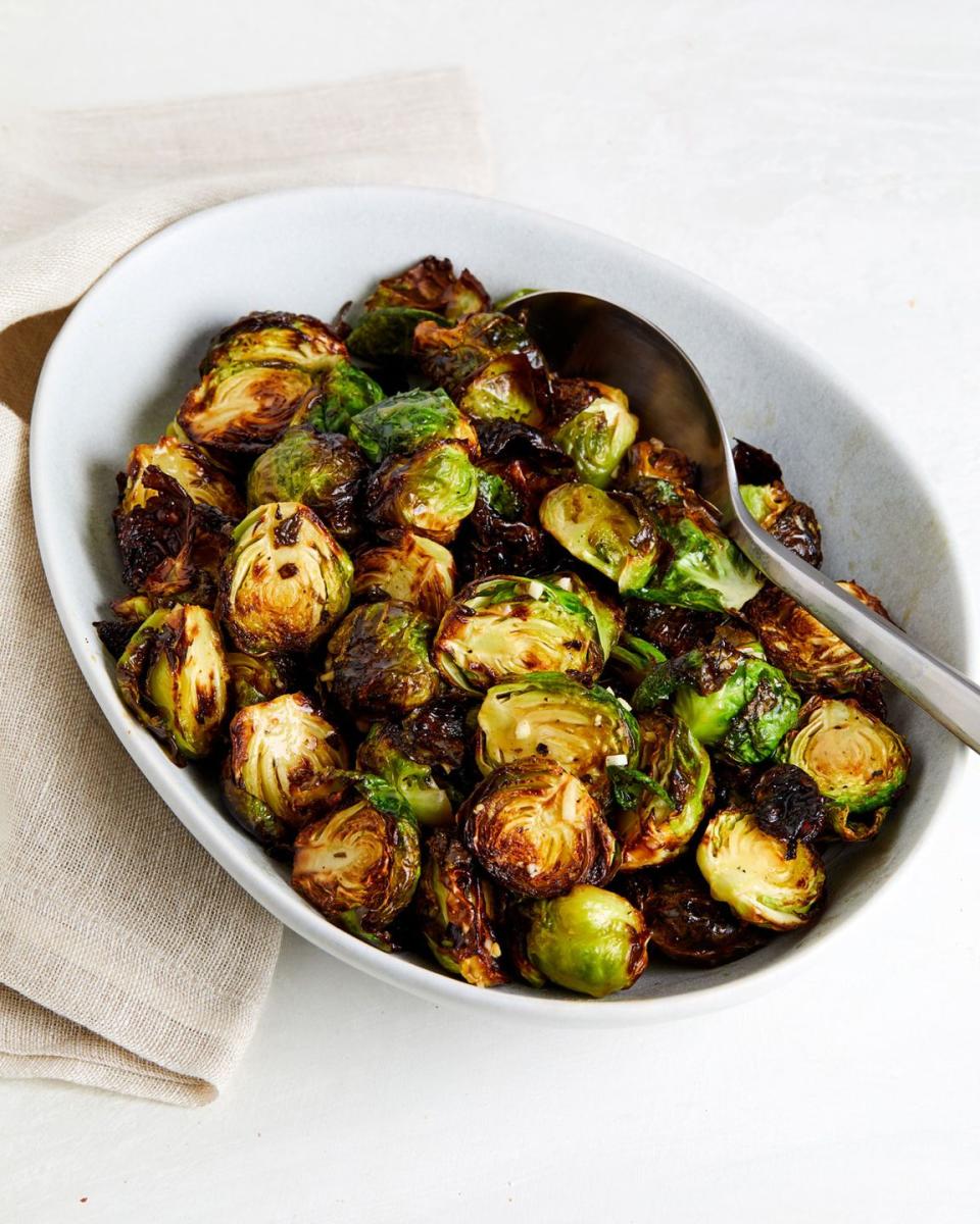 <p>Crispy, tender brussels are possible in only 18 minutes thanks to your air fryer. The quick dressing makes them a little more vibrant and brightens the veggie up—skip or replace the honey with agave or maple if you don't eat it. </p><p>Get the <strong><a href="https://www.delish.com/cooking/recipe-ideas/a35047084/air-fryer-brussels-sprouts-recipe/" rel="nofollow noopener" target="_blank" data-ylk="slk:Air Fryer Brussels Sprouts recipe;elm:context_link;itc:0;sec:content-canvas" class="link ">Air Fryer Brussels Sprouts recipe</a></strong>.</p>