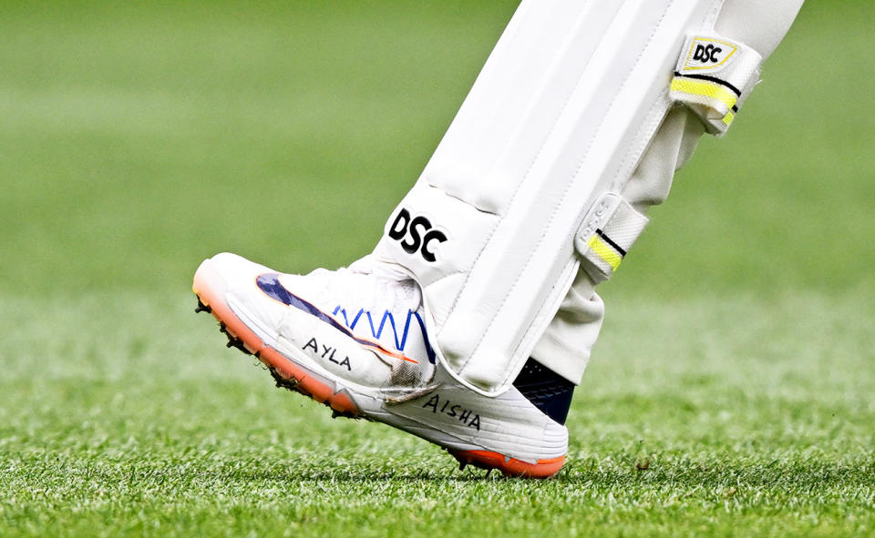 Usman Khawaja, pictured here with his daughters' names on his shoes.