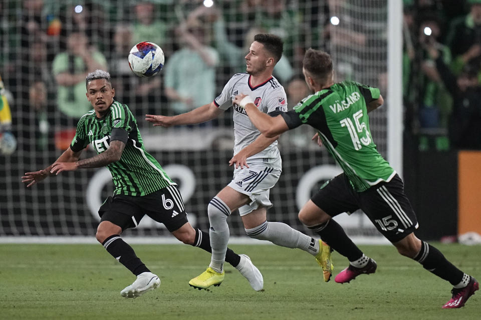 St Louis City FC midfielder Tomas Ostrak (7) battles Austin FC midfielder Daniel Pereira (6) and defender Leo Vaisanen (15) for control of the ball during the first half of an MLS soccer match in Austin, Texas, Saturday, Feb. 25, 2023. (AP Photo/Eric Gay)