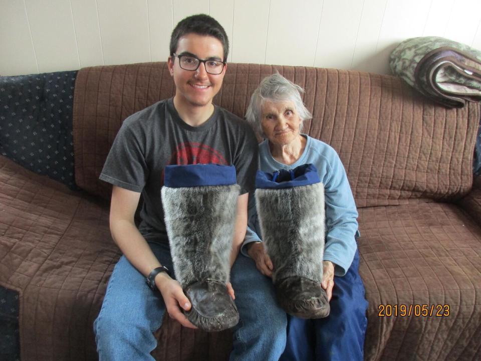 Nicholas Flowers and his grandmother, Andrea Flowers. Nicholas' grandmother taught him to make sealskin boots.