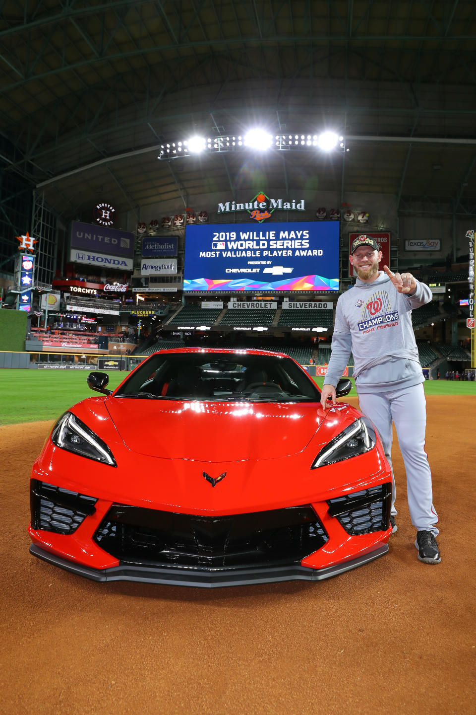 HOUSTON, TX - OCTOBER 30: Stephen Strasburg #37 of the Washington Nationals receives the 2019 Willie Mays World Series MVP award presented by Chevy after Game 7 of the 2019 World Series between the Washington Nationals and the Houston Astros at Minute Maid Park on Wednesday, October 30, 2019 in Houston, Texas. (Photo by Alex Trautwig/MLB Photos via Getty Images)