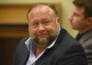 Infowars founder Alex Jones appears in court to testify during the Sandy Hook defamation damages trial at Connecticut Superior Court in Waterbury, Conn. Thursday, Sept. 22, 2022. Jones was found liable last year by default for damages to plaintiffs without a trial, as punishment for what the judge called his repeated failures to turn over documents to their lawyers. The six-member jury is now deciding how much Jones and Free Speech Systems, Infowars’ parent company, should pay the families for defaming them and intentionally inflicting emotional distress. (Tyler Sizemore/Hearst Connecticut Media via AP, Pool)