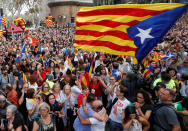 <p>People celebrate after the Catalan regional parliament passes the vote of independence from Spain in Barcelona, Spain, Oct. 27, 2017. (Photo: Yves Herman/Reuters) </p>