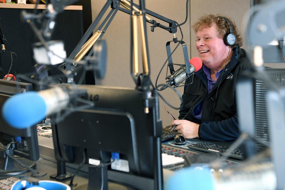 Pat Ryan is seen here in 2019 hosting his sports radio talk show, the WISE Guys, from the Asheville Radio Group building. Ryan was diagnosed with colon cancer in 2018 and had been continuing to host the show while receiving treatment. He died Nov. 17.
